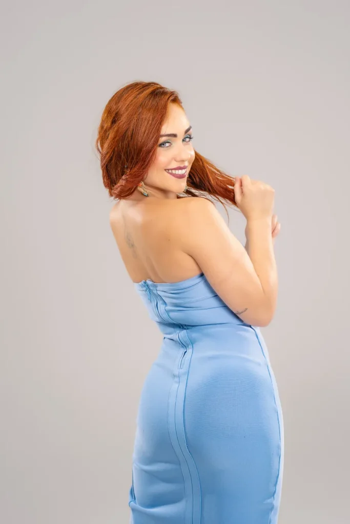 Irene Palomares smiling in a blue dress